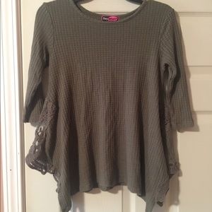 Cute olive shirt with lace on the sides. Like new!